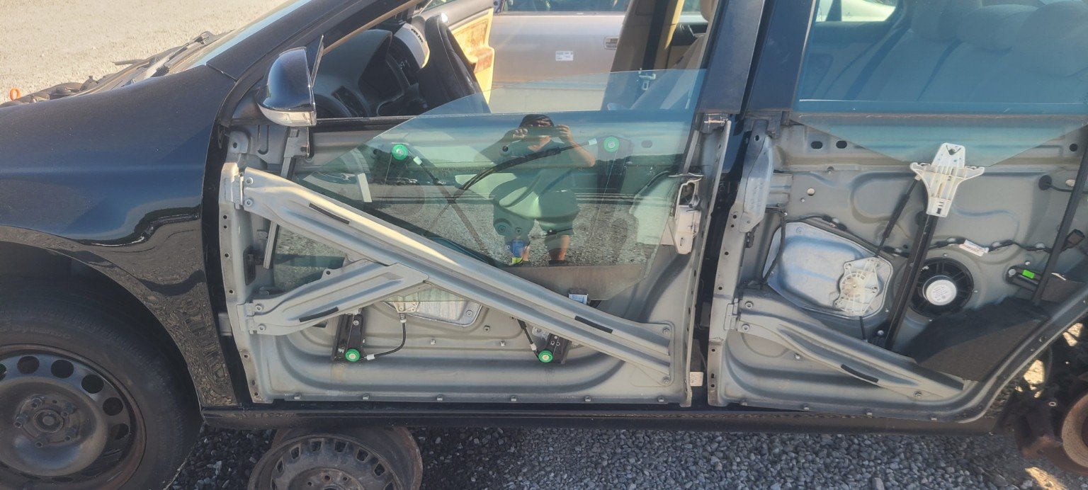 Vehicle door opened for automotive power window repair